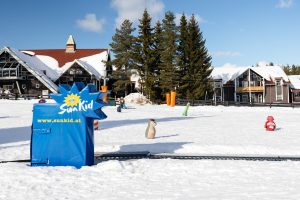 Skiskolens tæppelift i centrum af Trysil Turistsenter